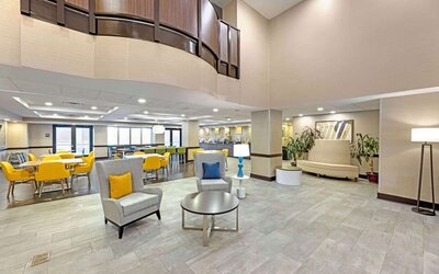 Lobby and coworking lounge at Comfort Inn & Suites Arlington Heights - Schaumburg.