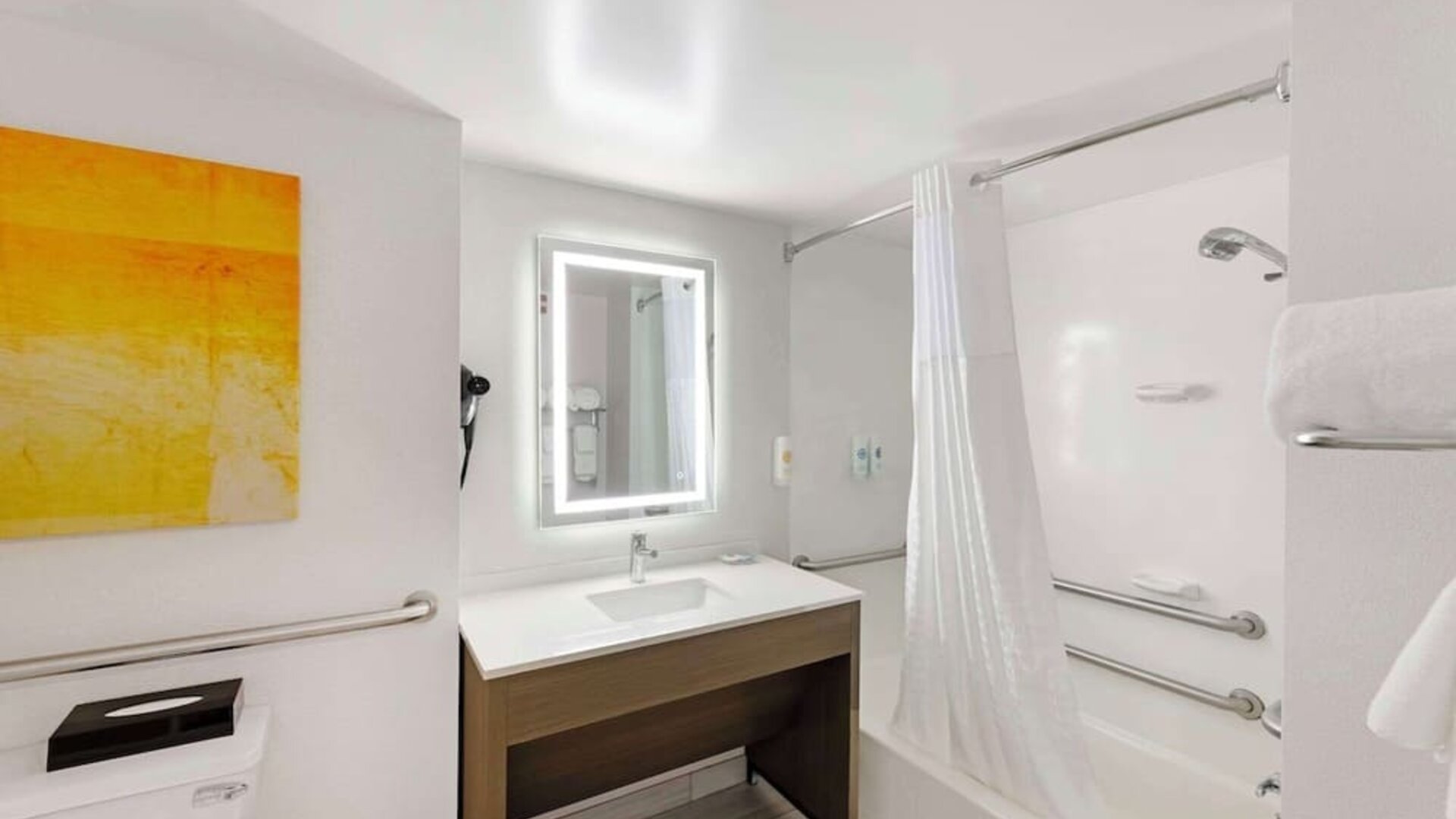 Private bathroom with tub at Comfort Inn & Suites Arlington Heights - Schaumburg.