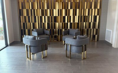 Lobby seating at Palace Inn Blue 290 W 43rd & Bingle Rd.