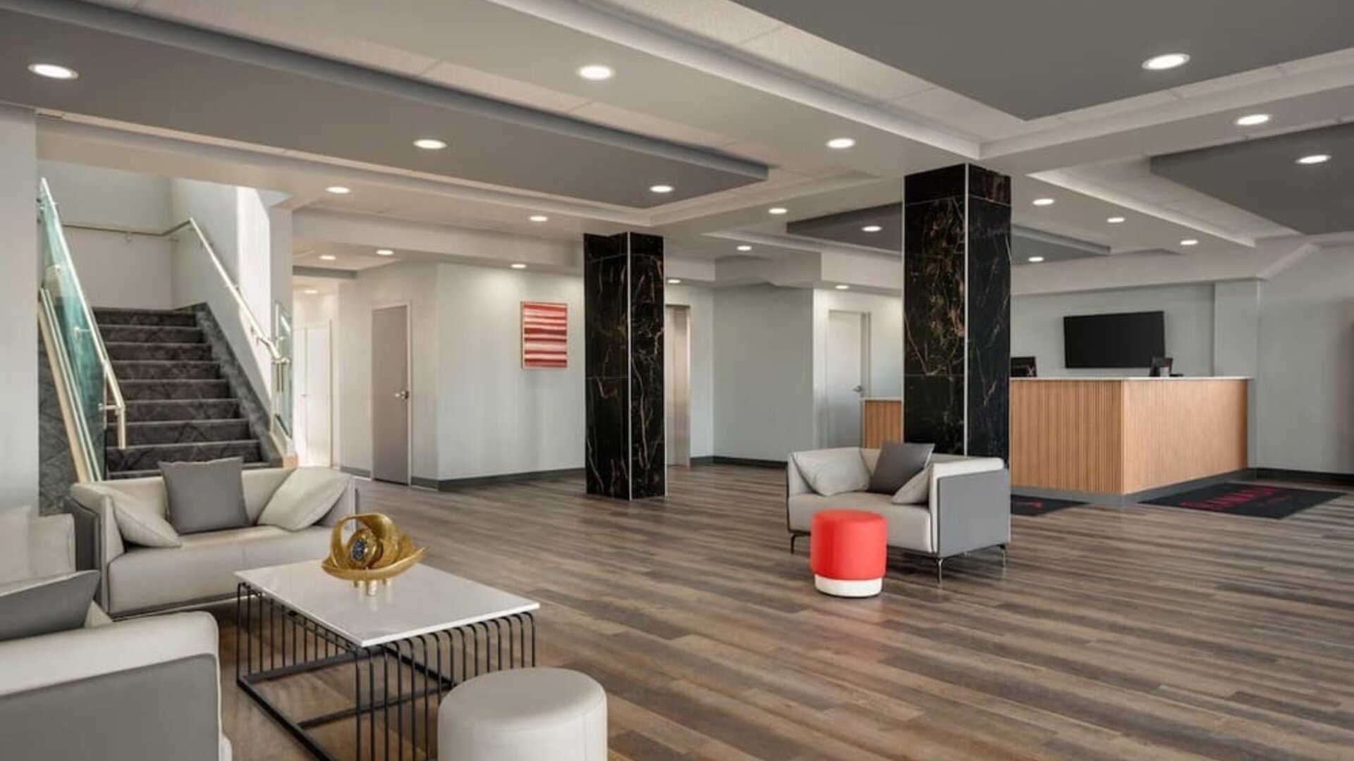 Lobby area at Ramada By Wyndham West Edmonton Hotel & Suites.