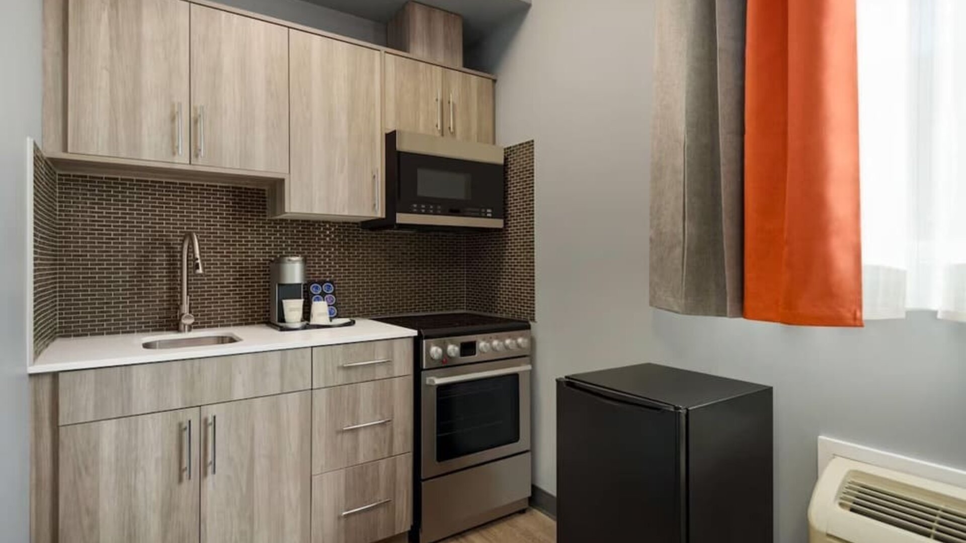 Kitchen at Ramada By Wyndham West Edmonton Hotel & Suites.