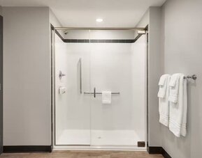 Guest bathroom at Ramada By Wyndham West Edmonton Hotel & Suites.