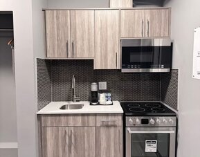 Kitchen at Ramada By Wyndham West Edmonton Hotel & Suites.