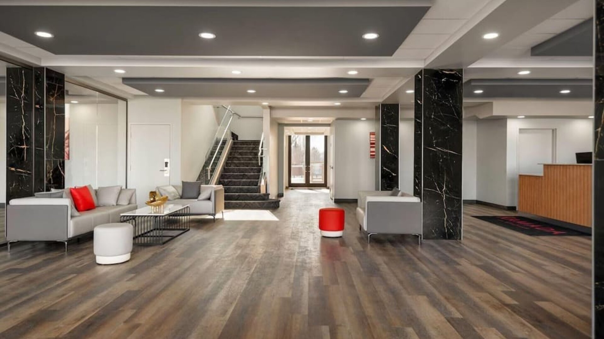 Lobby area at Ramada By Wyndham West Edmonton Hotel & Suites.