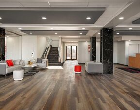 Lobby area at Ramada By Wyndham West Edmonton Hotel & Suites.
