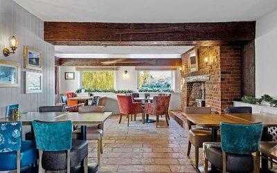 Dining area at The Mill Hotel - Surya Hotels
