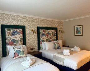 Day room at Thatcher's Hotel - Surya Hotels.