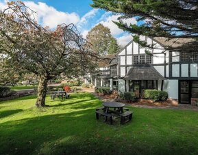 Garden at Thatcher's Hotel - Surya Hotels.