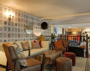 Indoor lounge at The George Hotel - Surya Hotels.