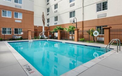 Outdoor pool at Candlewood Suites Fort Myers/Sanibel Island.