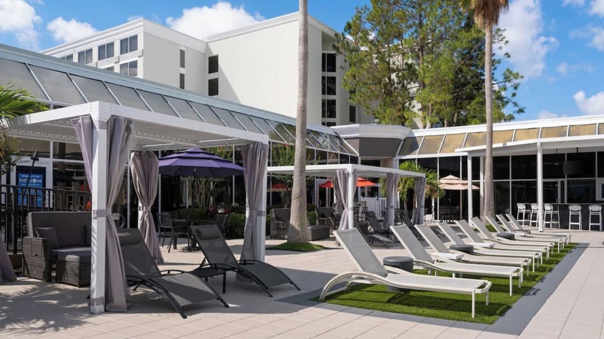 Loungers at at Holiday Inn Resort Kissimmee By The Parks By IHG.