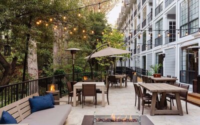 Hotel terrace at The Inn At Saratoga, Tapestry Collection By Hilton.
