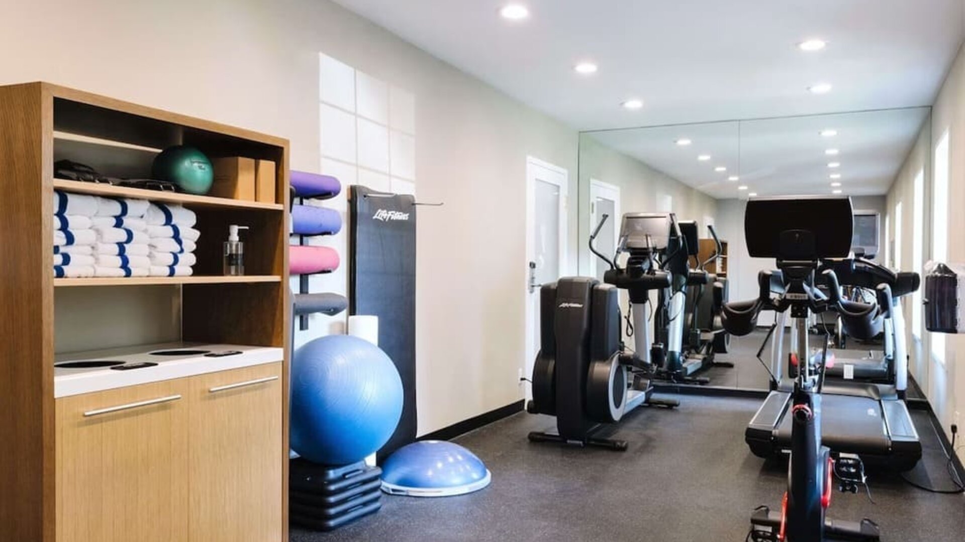 Fitness center at The Inn At Saratoga, Tapestry Collection By Hilton.
