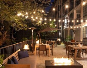 Hotel terrace at The Inn At Saratoga, Tapestry Collection By Hilton.
