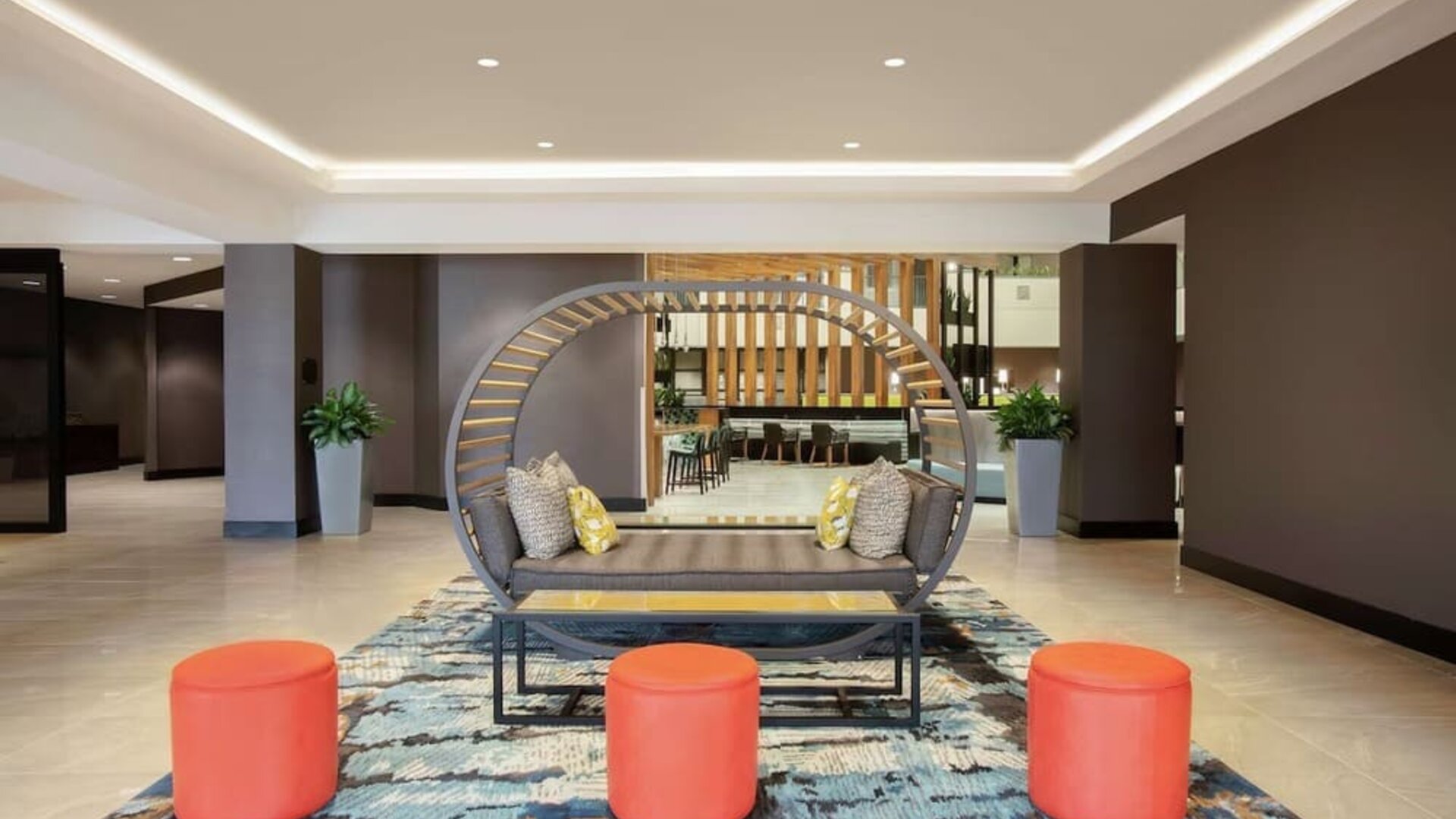 Lobby seating at Embassy Suites By Hilton Orlando Airport.