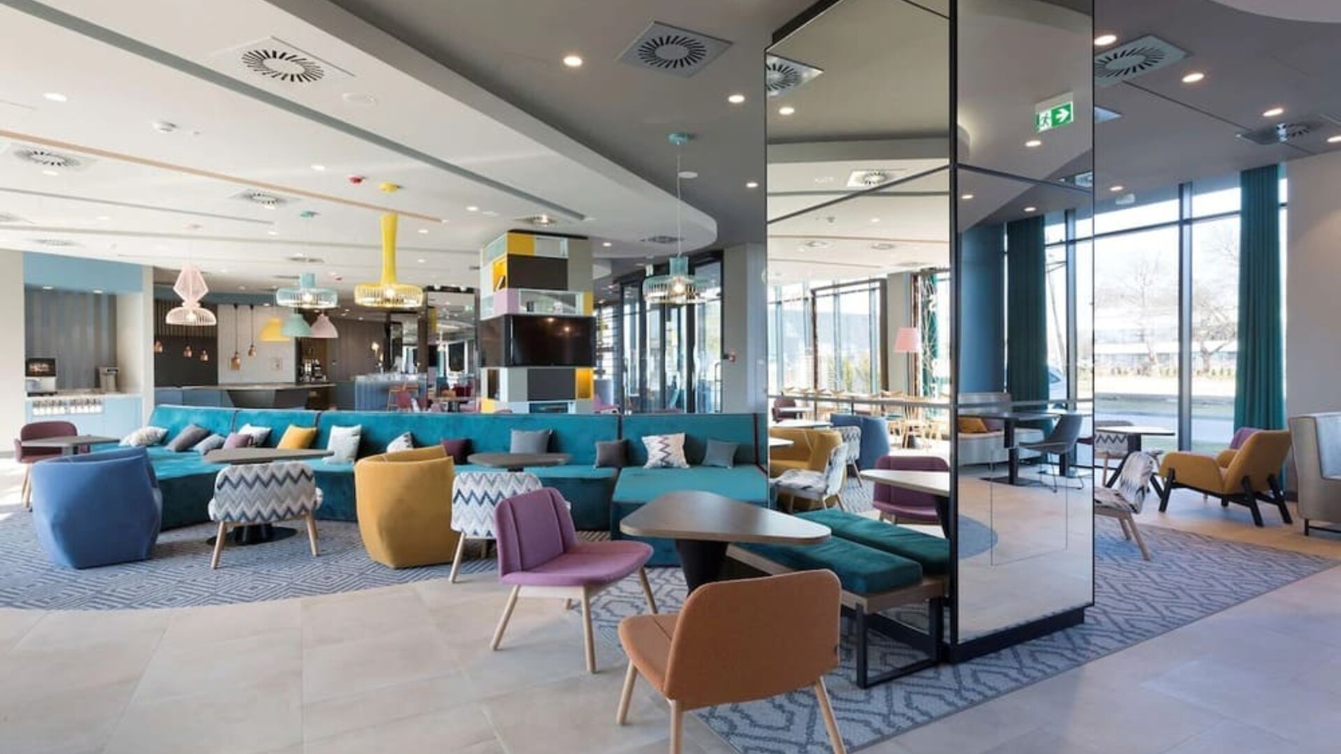 Lobby and lounge at Hampton By Hilton Krakow Airport.