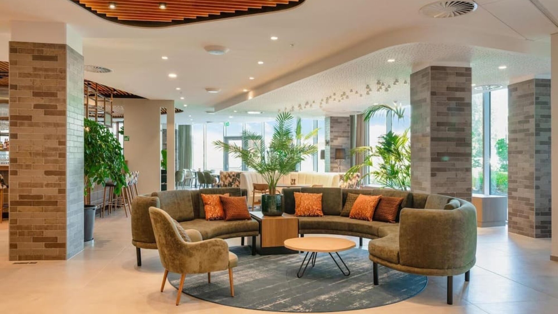 Lobby and lounge at Hilton Garden Inn Brussels Airport.