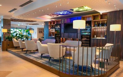 Lobby and lounge at Hilton Garden Inn Brussels Airport.