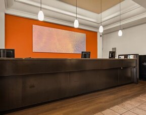 Reception desk at Best Western The Plaza Hotel Honolulu Airport.