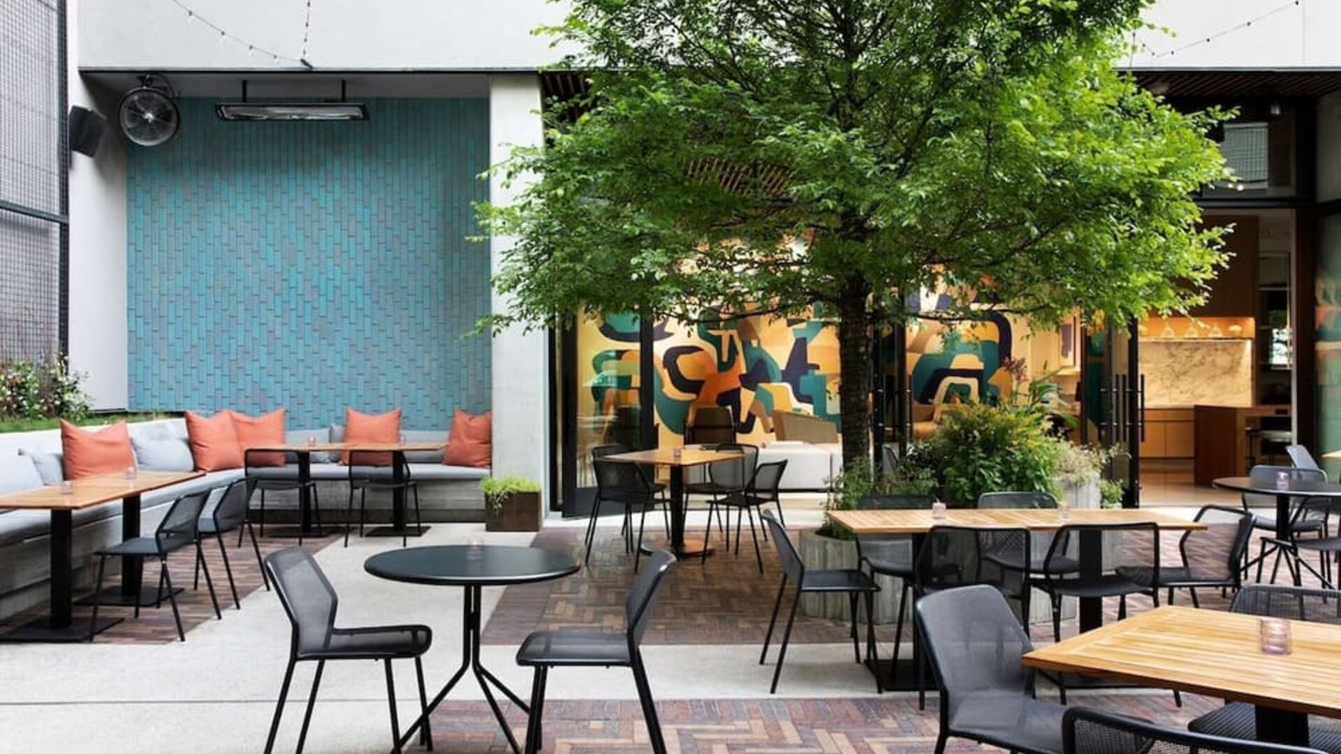 Outdoor dining at Canopy By Hilton Austin Downtown.