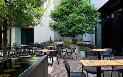 Outdoor dining at Canopy By Hilton Austin Downtown.