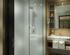 Bathroom at Ramada Laval By Wyndham.