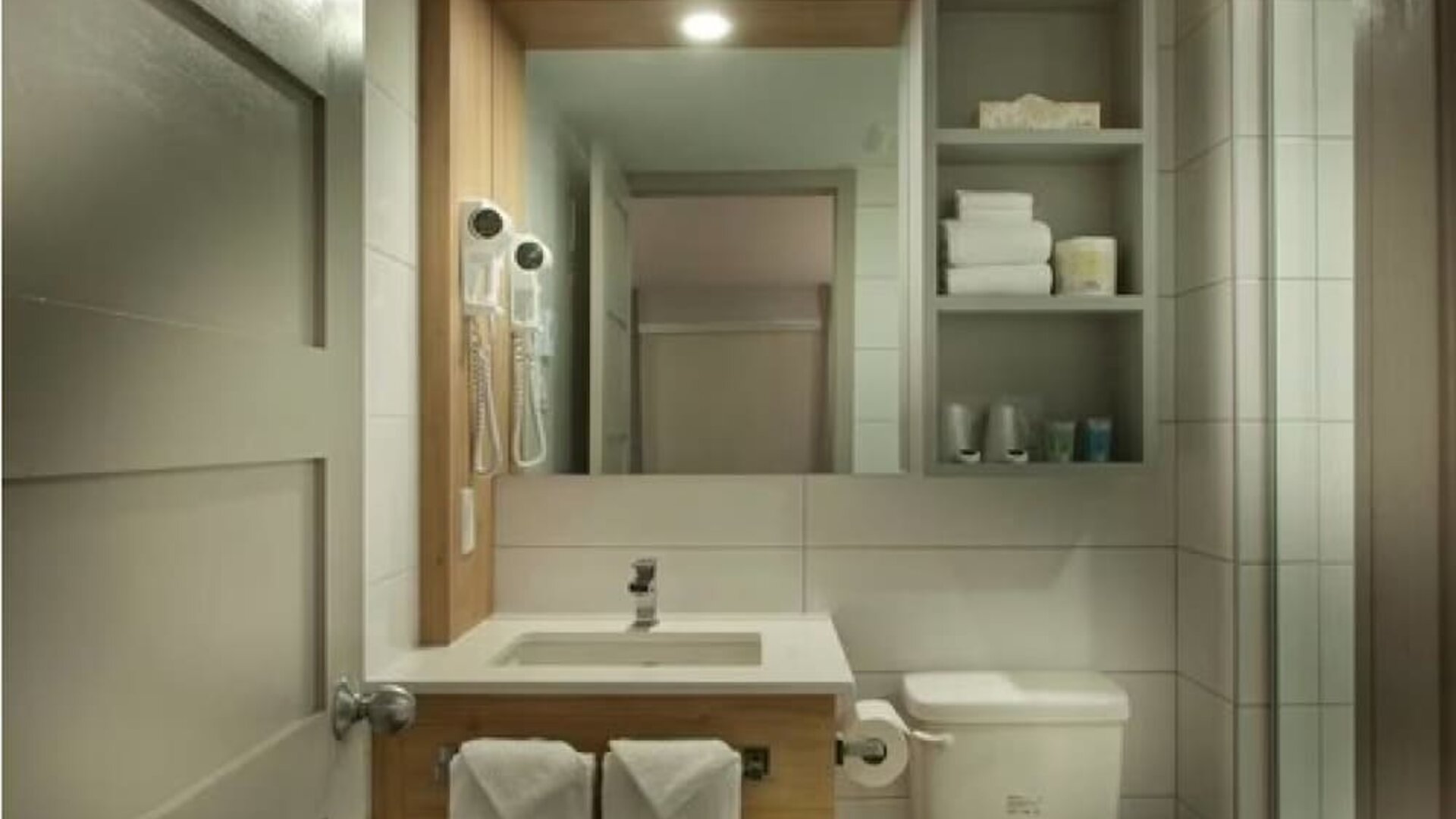 Bathroom at Ramada Laval By Wyndham.