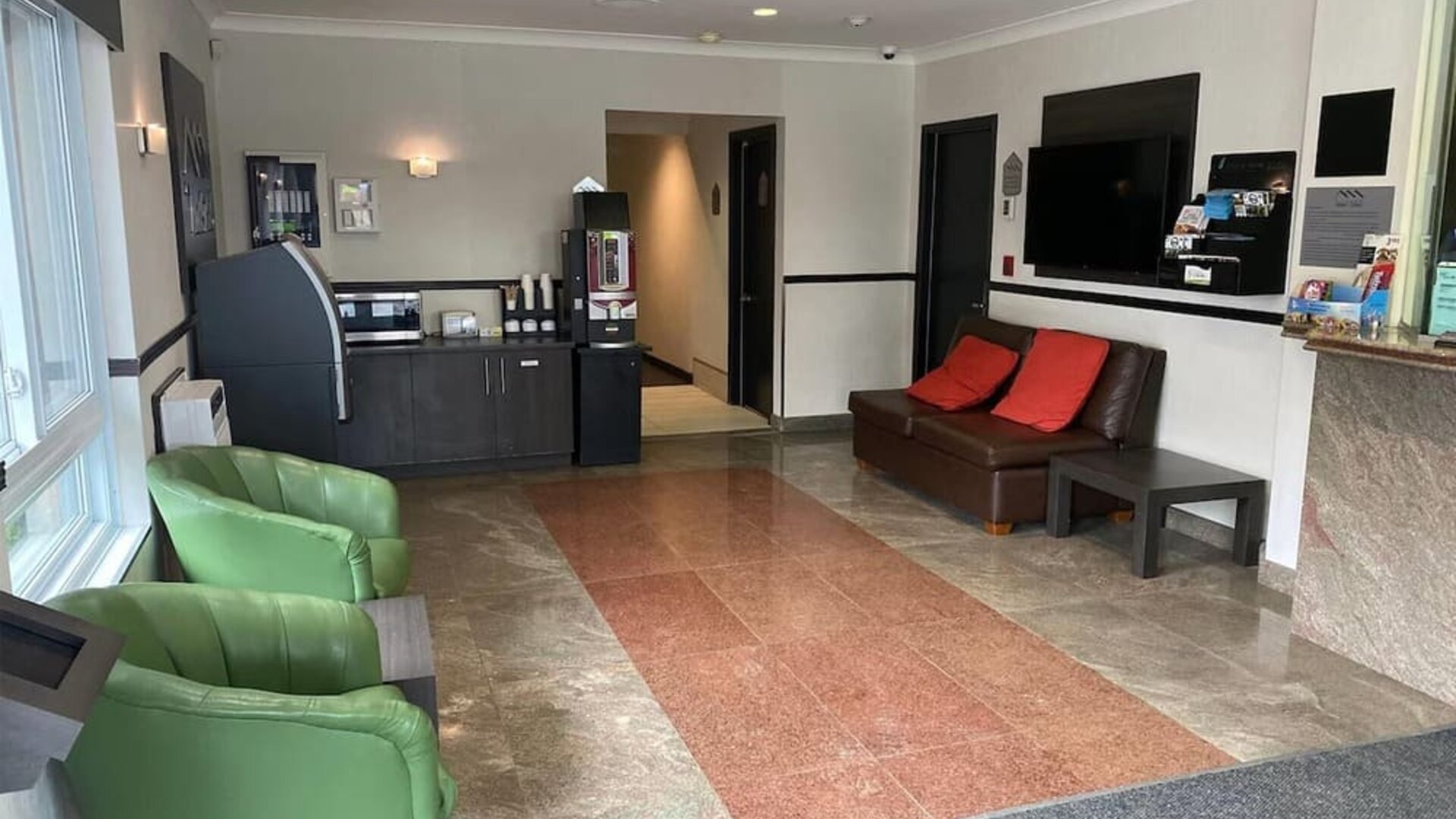 Day room at Ramada Laval By Wyndham.