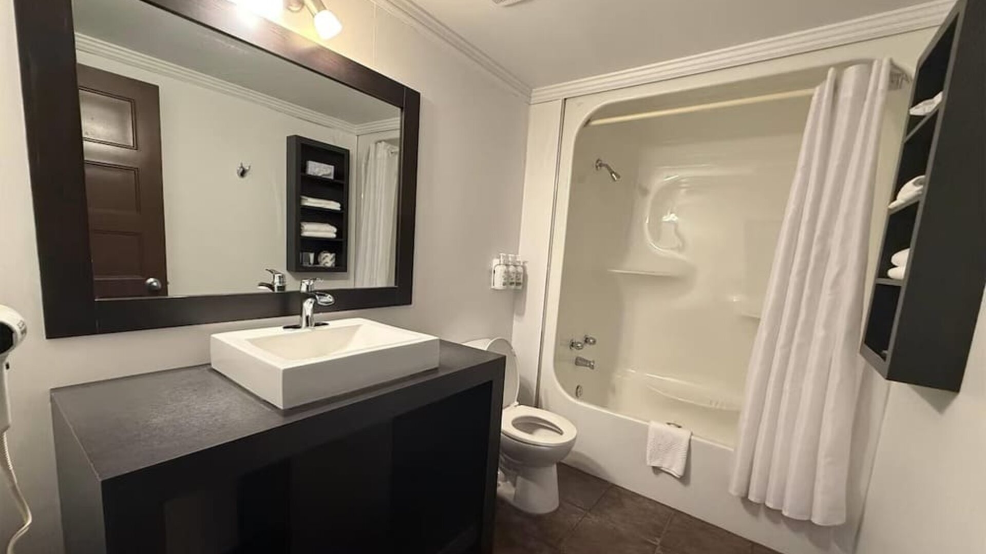Bathroom at Ramada Laval By Wyndham.