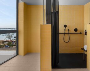 Bathroom at at ROK Hotel Kingston, Tapestry Collection By Hilton.