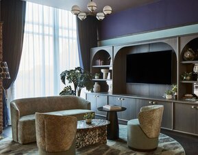 TV area at Leonardo Hotel Dublin Parnell Street.