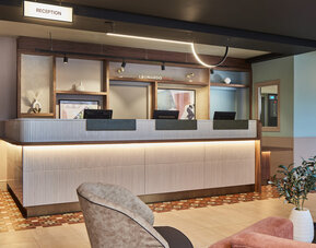 Reception desk at Leonardo Hotel Dublin Christchurch.