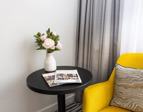 Chair and side table at Leonardo Hotel Dublin Christchurch.