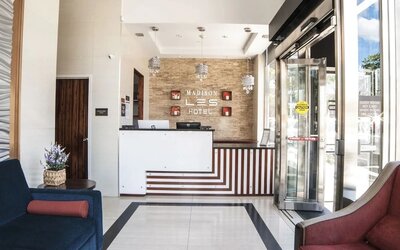 Reception area at Madison LES Hotel welcoming guests.