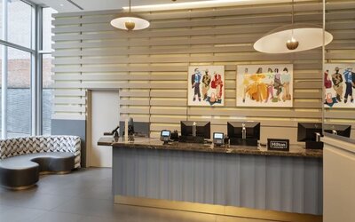 Reception area with comfortable seating at the Hilton Fashion District. 