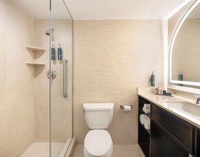 Modern, fully equipped bathroom at Hilton Fashion District.
