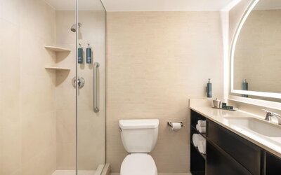 Modern, fully equipped bathroom at Hilton Fashion District.