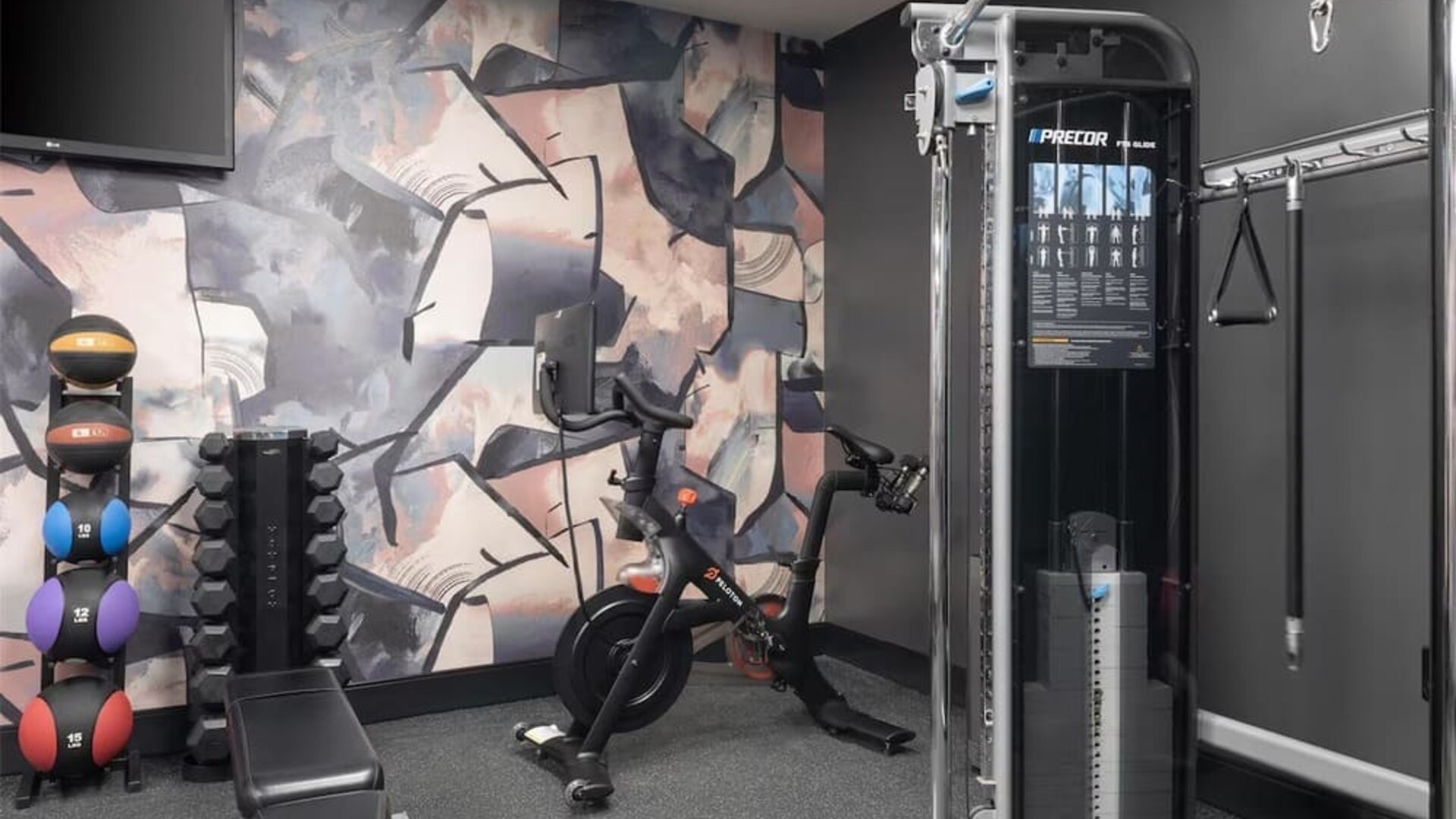 The hotel’s fitness center, equipped with a range of exercise machines.