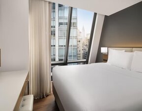 Comfortable day room with work station at Best Western Premier Empire State Hotel.