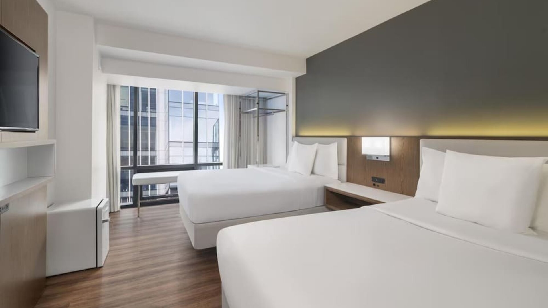 Comfortable day room with natural light at Best Western Premier Empire State Hotel.