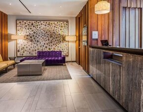 Lobby and coworking lounge at Best Western Premier Herald Square.