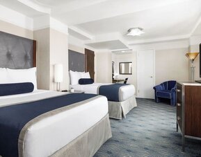 Day use room with work desk and natural light at New Yorker by Lotte Hotels.