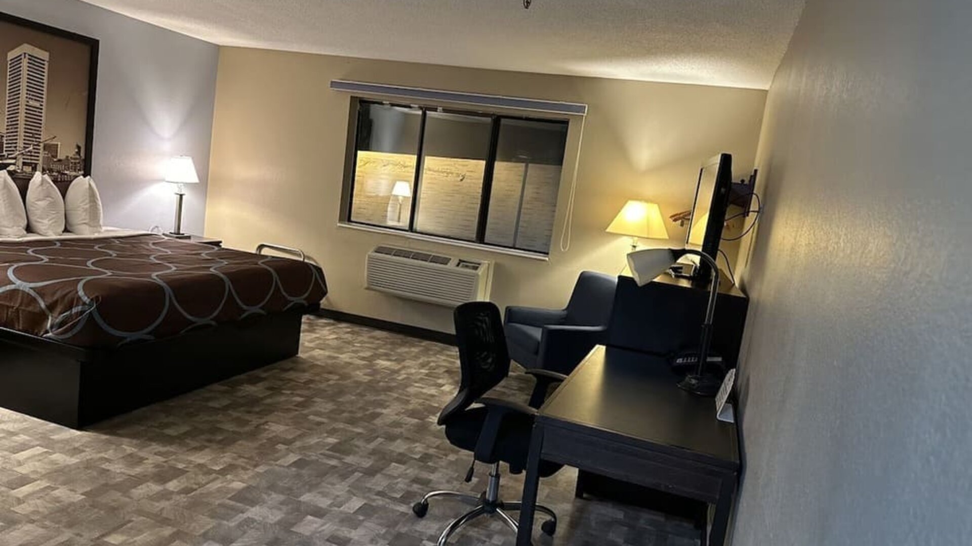 Day room with work desk at Super 8 By Wyndham Baltimore/Essex Area.