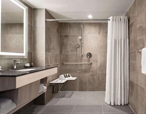 Bathroom with shower at Wingate By Wyndham New York Midtown South/5th Ave.