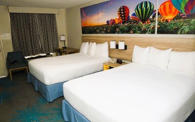 Day room with work desk at Days Inn By Wyndham East Albuquerque.