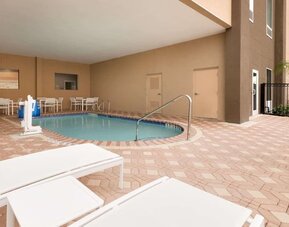 Outdoor pool at Country Inn & Suites By Radisson, Katy - Houston West.