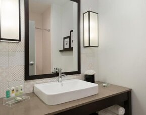 Modern bathroom at Country Inn & Suites By Radisson, Katy - Houston West.