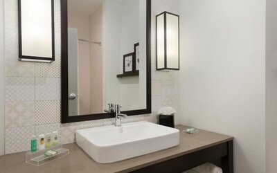 Modern bathroom at Country Inn & Suites By Radisson, Katy - Houston West.