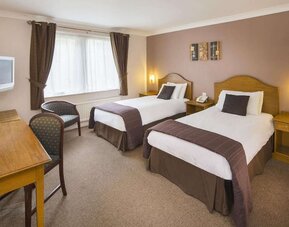 Day room with workspace at The Old Golf House Hotel.