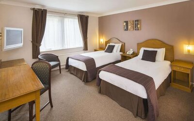 Day room with workspace at The Old Golf House Hotel.